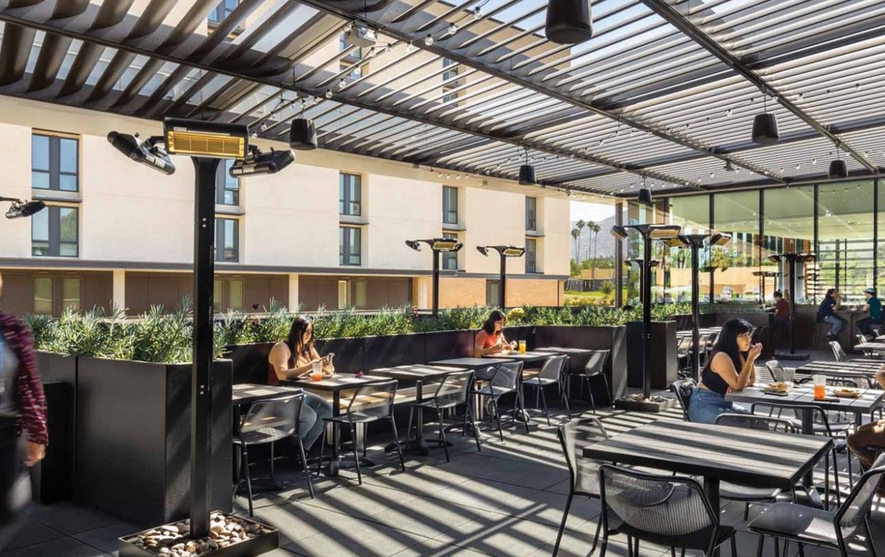 students eating outside on the patio at Glasgow