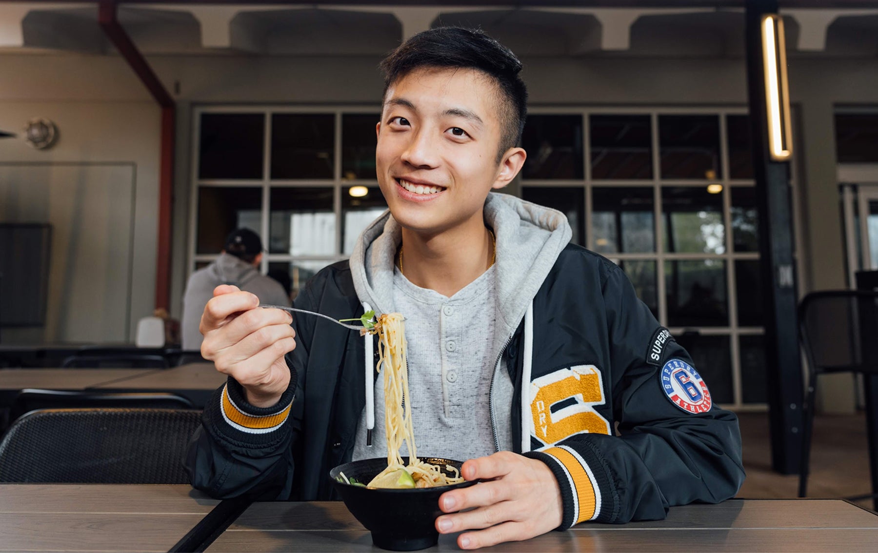 Student eating lunch at Lothian