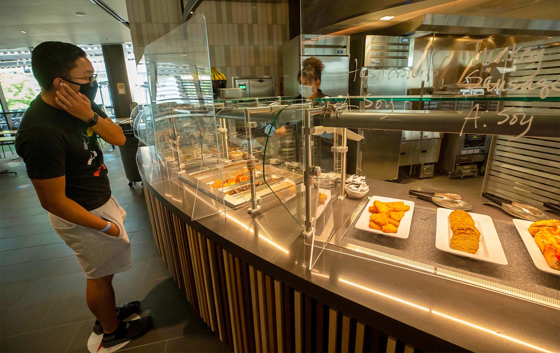 Student at Glasgow ordering lunch