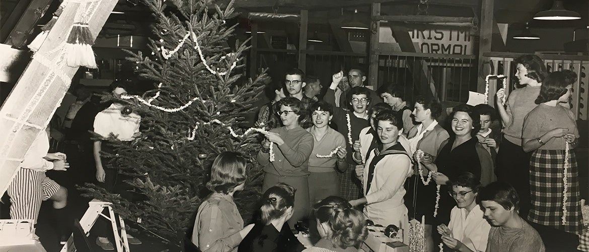 The Barn Past decorating Christmas tree