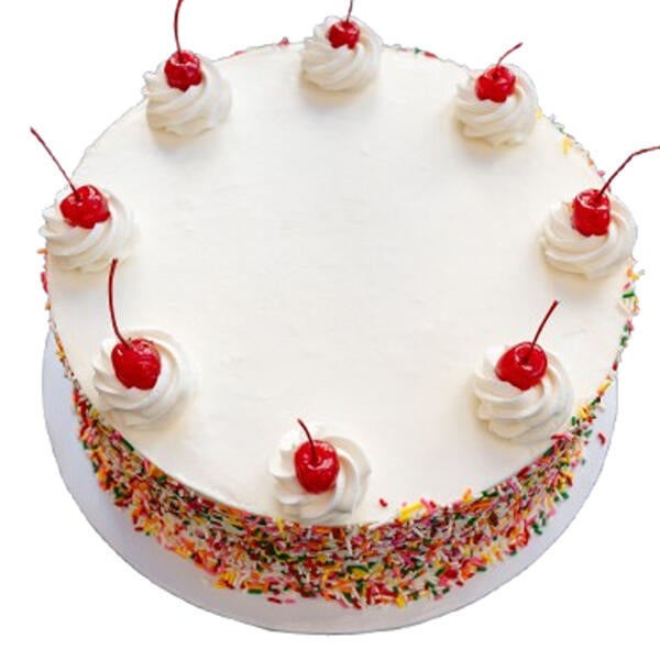 white birthday cake with cherries