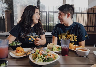 Students Chatting During Meal