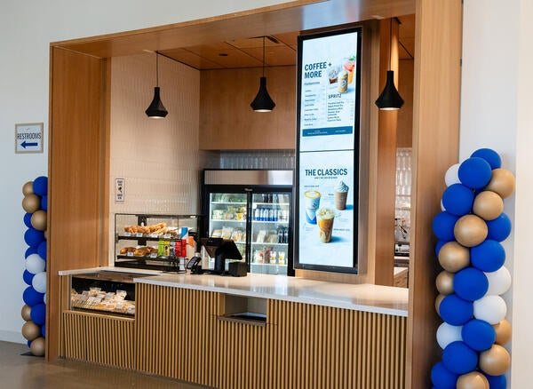 Biz cafe front counter with UCR colored balloons