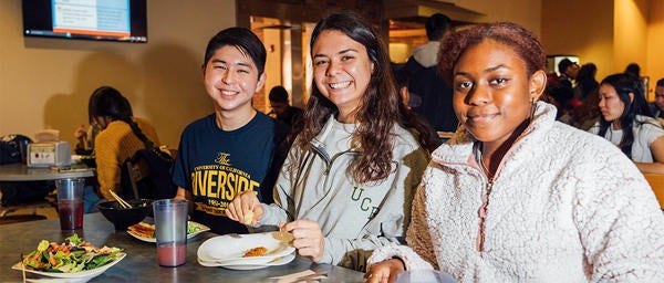 Students Dining Together and Smiling