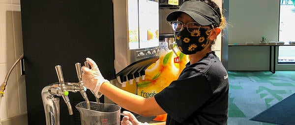 Dining Student Staff Filling Water