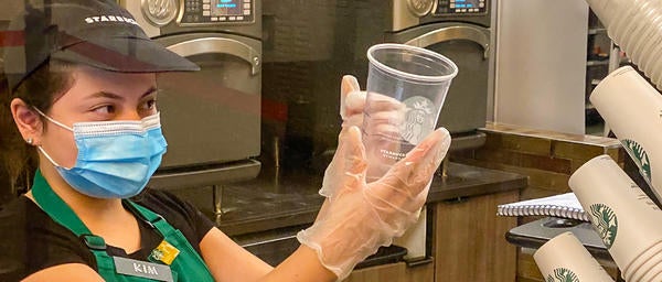 Dining Student Staff Marking Coffee Cup at Starbucks