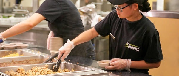 Students Preparing to Serve Entree at Lotian