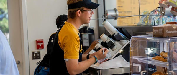 Students taking order at Emerbee's