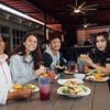 Five students eating at Lothian.