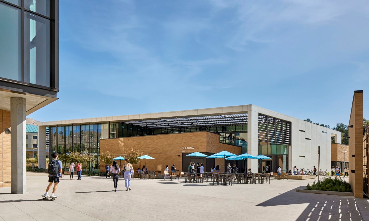 Students walk around the outside of the Glasgow Residential Restaurant.